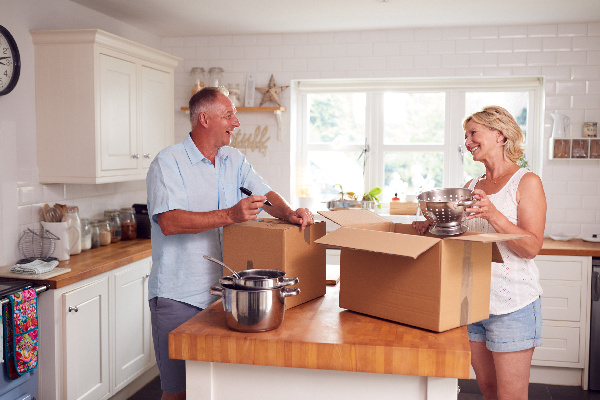 packing items away in boxes